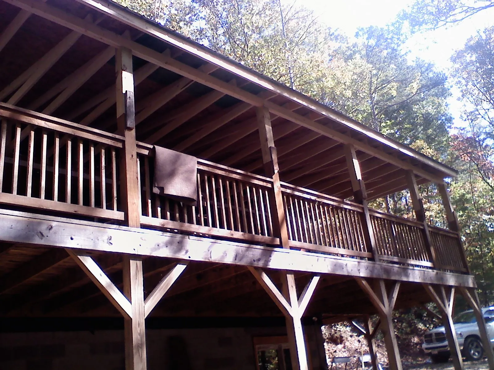 Timber framing under a new elevated porch and deck — Roof Leak Repair in Burleson by Roofing Brothers